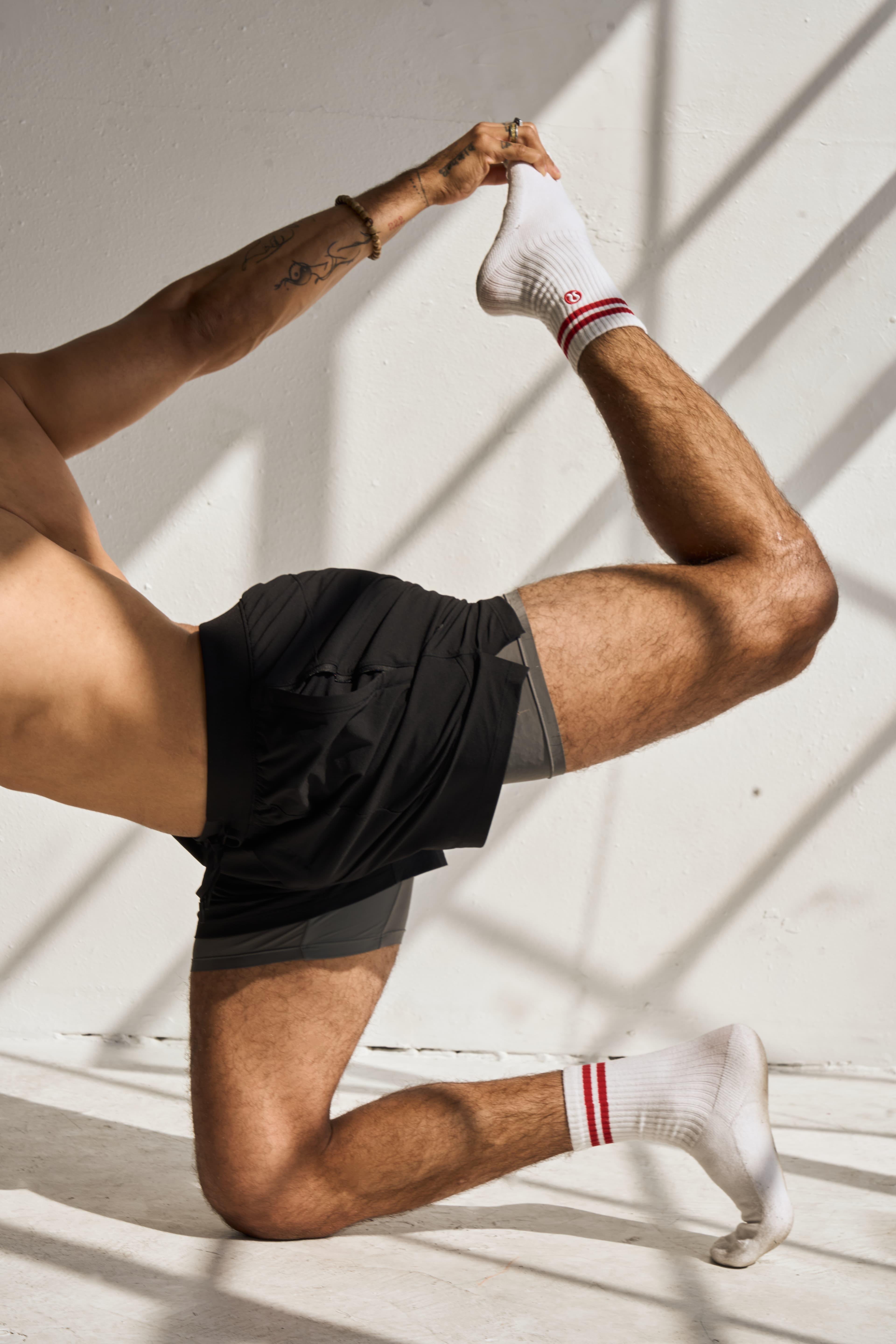 Greg performing a mobility stretch